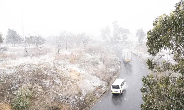 A view of a snow-covered streets during snowfall in Johannesburg