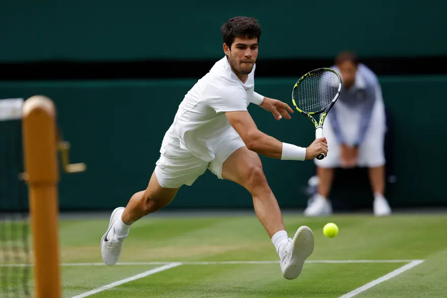 Carlos Alcaraz will play No 6 seed Holger Rune for a place in the Wimbledon semi-finals.