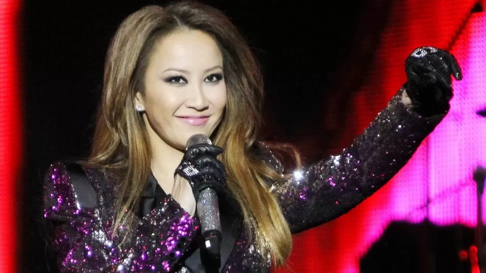Coco Lee: Disney star and pop singer dies at 48