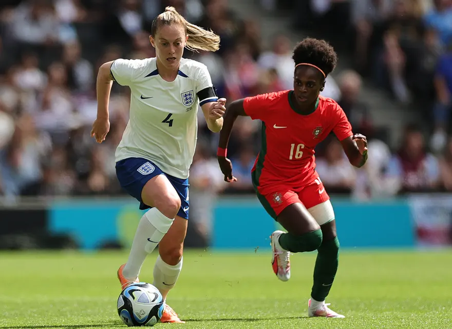 Keira Walsh gets away from Portugal’s Diana Silva during a friendly match this month.