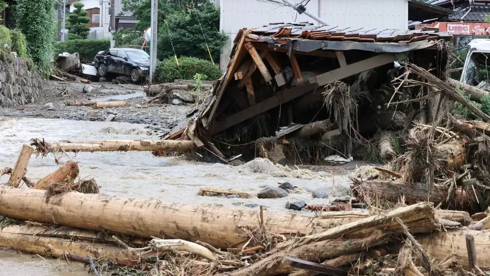 Death toll climbs in severe monsoon season in China and Japa