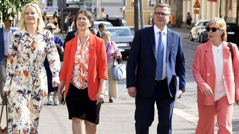 Riikka Purra (left) has joined the prime minister