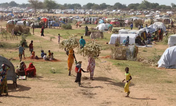 Sudanese refugees who fled the conflict in Sudan gather