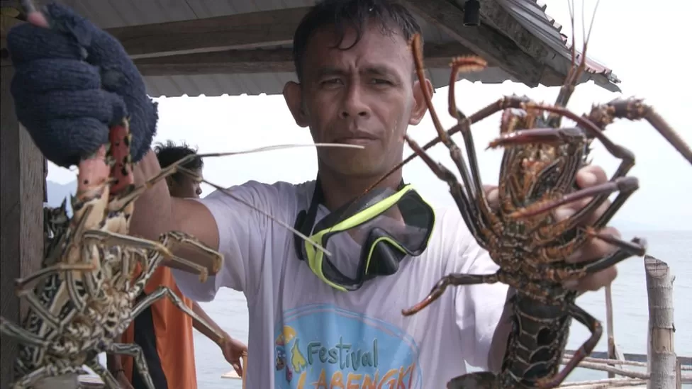 Tawing with his catch