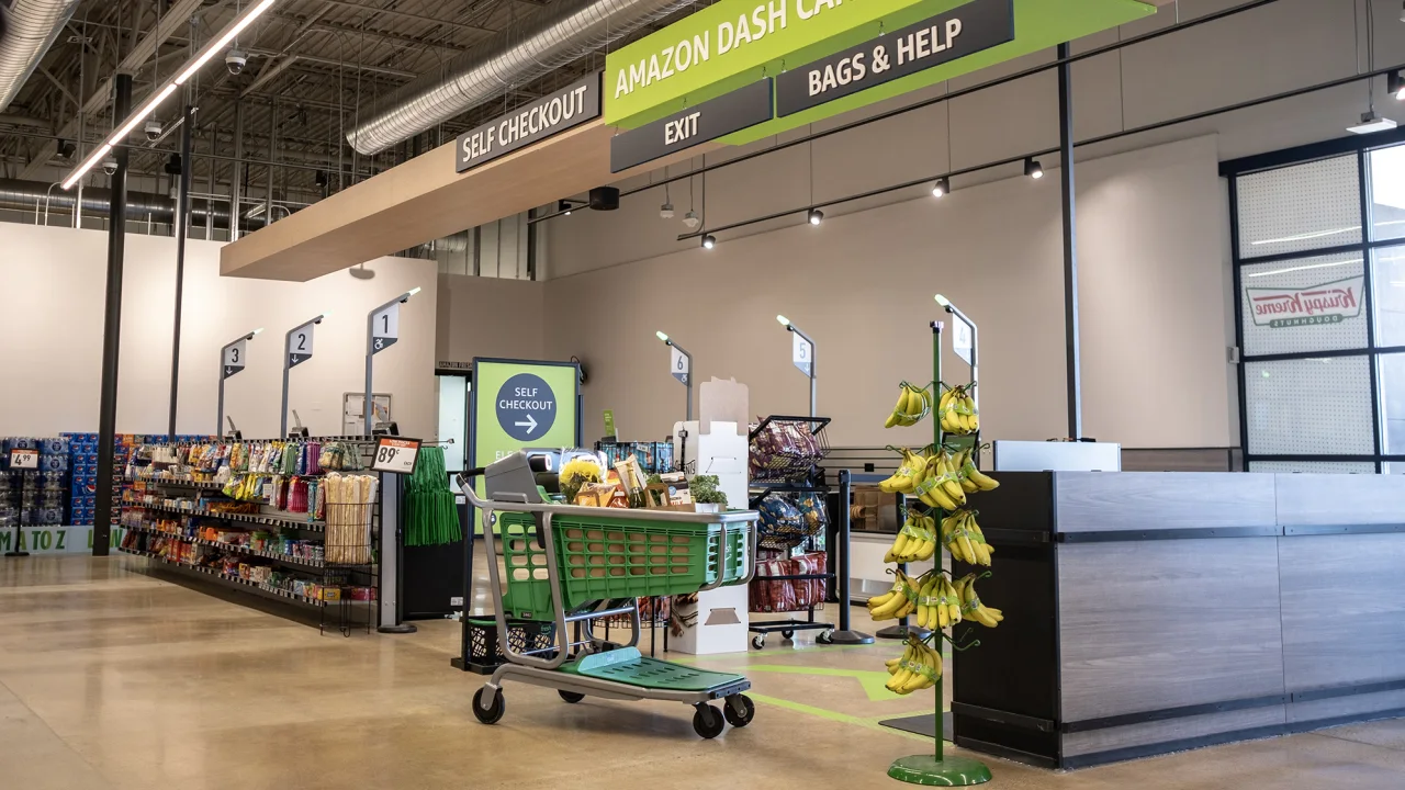Business: Amazon Fresh grocery chain has struggled.