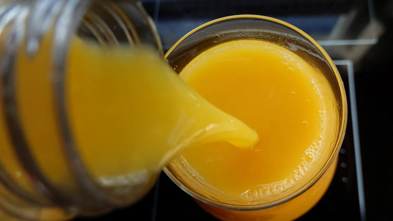 Business News: Orange juice futures are hitting record highs.