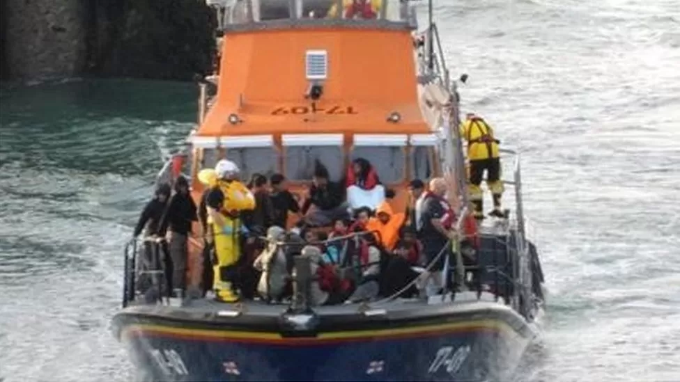 France arrests four people over fatal sinking