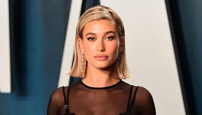 Hailey Bieber channels ’80s glamour in Rhode’s photoshoot