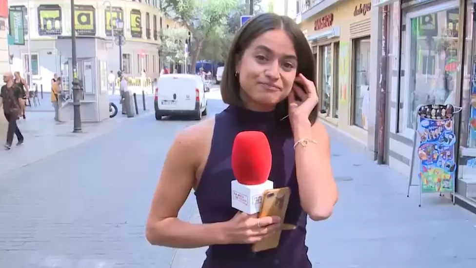 Anger in Spain after man appears to grope reporter