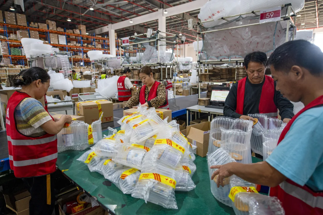 China’s e-commerce giants try to lure reluctant consumers