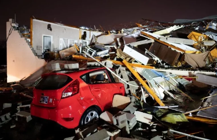 At least six dead as tornadoes rip through state.
