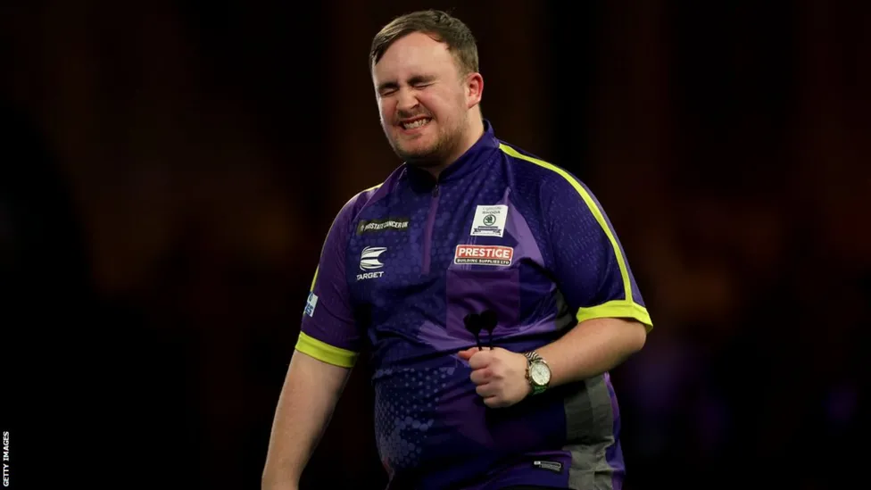 Luke Littler beats Rob Cross to reach Darts Championship final.